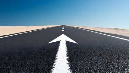 Asphalt road stretches towards a clear blue sky, marked by a bold white arrow, signifying forward progress and open horizons.