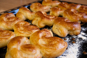 Freshly baked homemade buns. Homemade baked goods. Homemade food.