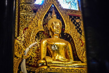 Obraz premium Golden Buddha statue, Architecture Lanna, Symbols of Buddhism at Muang Chiang Mai, Chiang Mai, Northern Thailand