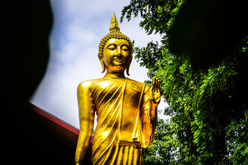 Golden Buddha statue, Architecture Lanna, Symbols of Buddhism at Muang Chiang Mai, Chiang Mai, Northern Thailand