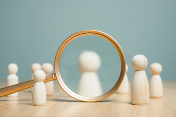 human resources, hr, human, resource, employee, recruitment, job, manager, hiring, executive. A group of people are standing in front of a magnifying. Concept of curiosity and intrigue.