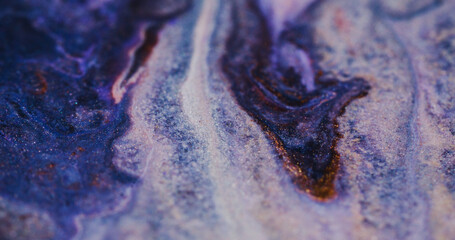 Paint ink blend. Shiny fluid spill. Defocused multicolor purple shimmering sparkling flow marble texture bright particles moving on abstract blurred bokeh light art background.