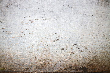 Rainwater leaks into the walls causing permanent damage and yellow stains, peeling wall paint and mold.