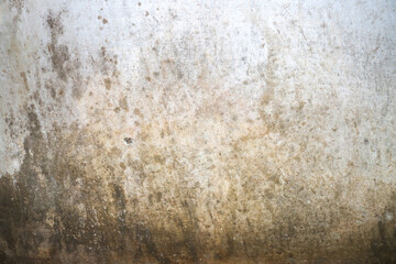 Rainwater leaks into the walls causing permanent damage and yellow stains, peeling wall paint and mold.