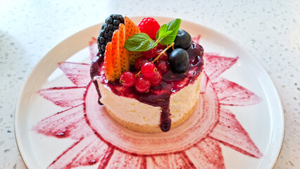 Berries cheesecake on a plate