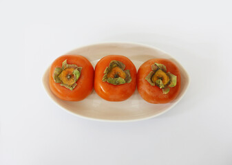 soft orange healthy ripe persimmon