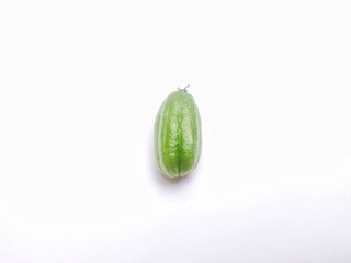 Averrhoa bilimbi, or Belimbing Wuluh or Belimbing Sayur is a type of star fruit on white. The fruit is native to Indonesia and the tropics. It tastes sour and is commonly used for seasoning dishes.