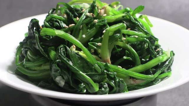 Spinach greens blanched in boiling water. Korean style vegetable side dish.

