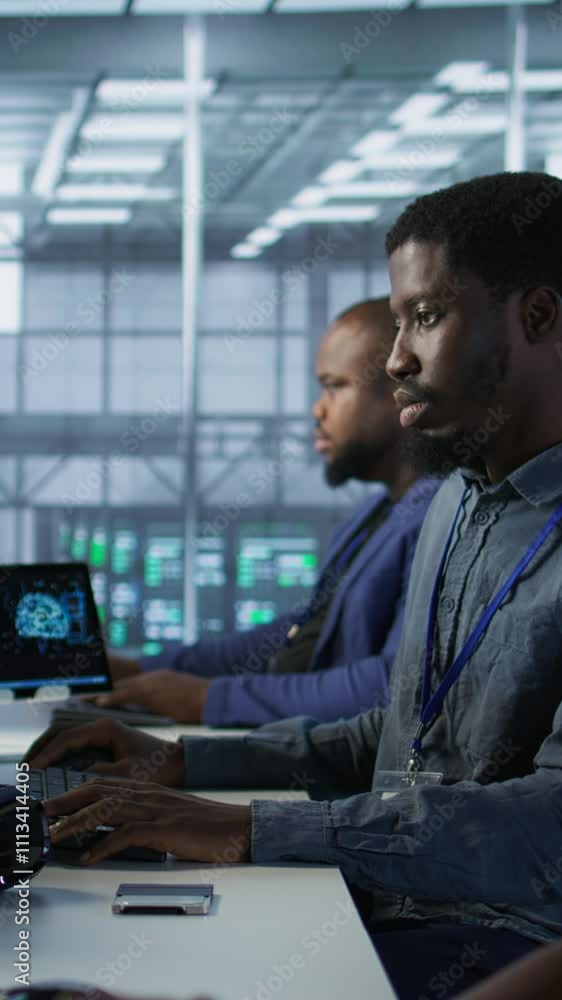 Poster vertical video team of engineers in data center developing and maintaining disaster recovery plans e