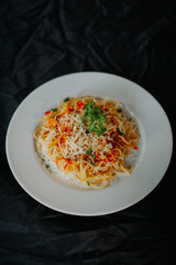 pasta with tomato sauce and basil