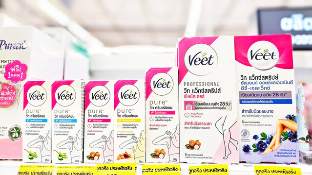Veet Hair Removal Creams on Supermarket Shelf: A vibrant display showcasing the diverse range of Veet hair removal creams. Thailand, December 3, 2024