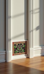 A beautifully designed corner of a room featuring elegant wall moldings and a vintage floor tile. Ideal for interior design, architecture, or home decor projects.