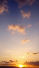 Fototapeta premium sunset and big clouds behind sky in a background