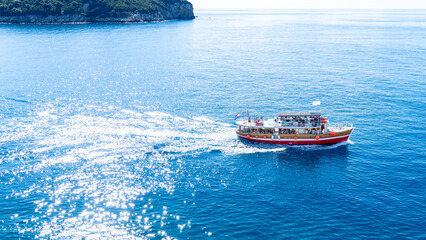 A Boat Across a Glistening Sea