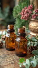 Recycled Glass Bottles with Essential Oils on Rustic Wooden Table with Dried Eucalyptus Leaves Natural Product Concept