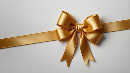 Close-up of a golden ribbon bow, symbolizing elegance and celebration