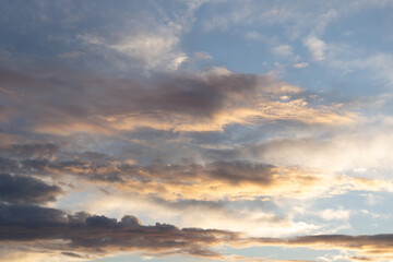 Sunset paints sky with vibrant hues background.