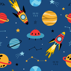 Fototapeta premium Seamless pattern with cute planets, stars, ufo, earth, constellations, rockets, space, saturn on dark blue background. Creative kids texture for fabric, prints, wallpaper, decorations, textiles.