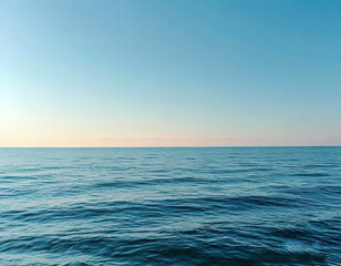 Obraz premium seascape background. sea and sky meet on the horizon. delicate blue color