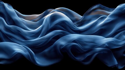 Obraz premium Flowing blue silk waves against black background