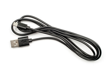 USB mini USB cable on a white background. Black cable for connecting devices.
