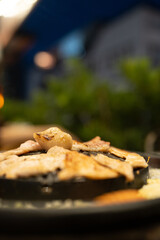 Thai style barbecue. It is the popular food in Asia by grill the pork, meat or sea food on the hot pan that can put the soup of vegetable around a pan too. Thai barbecue grill Pork on hot pan buffet.