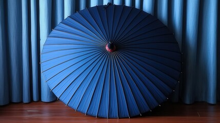 Elegant blue umbrella against matching curtains in minimalist interior design