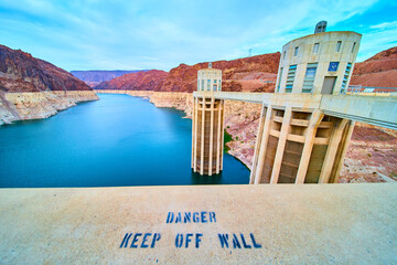 Hoover Dam and Lake Mead with DANGER KEEP OFF WALL Warning Eye-Level Perspective
