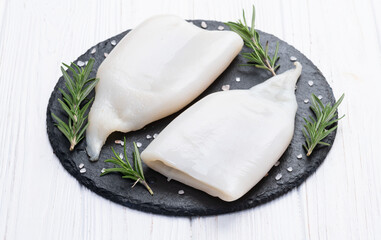 Squid tube and ring photography . Seafood top view