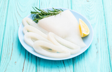 Squid tube and ring photography . Seafood top view