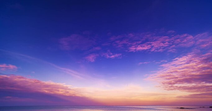 High quality 4K Time lapse of Majestic sunset or sunrise landscape Amazing light of nature cloudscape sky and Clouds moving away rolling 4k colorful sunset light dramatic clouds,Footage sky timelapse