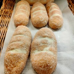 Freshly baked sweet bread rolls on display.
