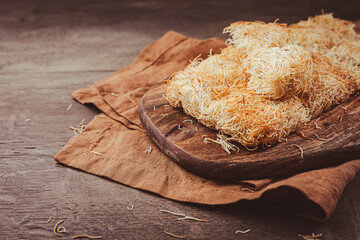 Butter roasted Kadayif pastry, fine dough threads for delicious sweet desserts, Turkish cuisne