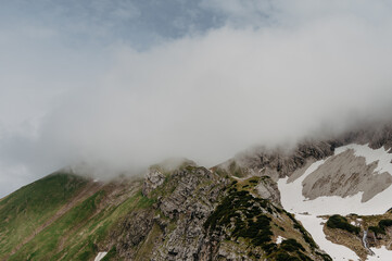 Misty Alpine Cliffs in German Mountains