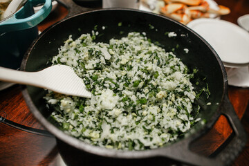 Veggie scallop rice mix in a skillet