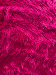 A close up of a pink fur texture