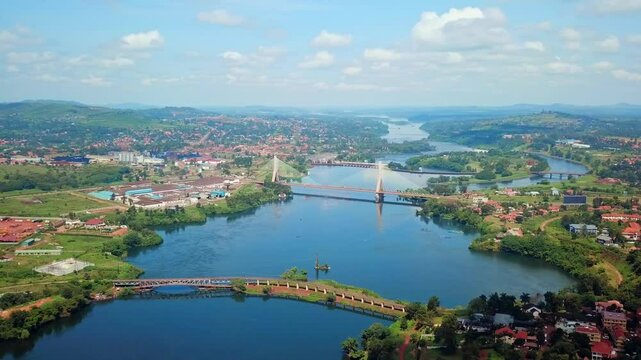 Jinja Nile Bridge Across The Nile River Connecting The Town Of Njeru to Jinja In Uganda, East Africa. Aerial Shot
