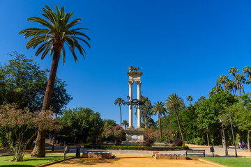 Seville, Spain - August 01, 2024: Murillo Gardens and Christopher Columbus Monument in Seville.