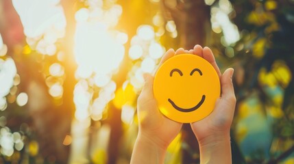 smile emoticon paper background, always Happy the concept of well-being and happiness.