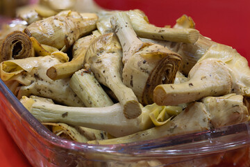 Detail View of Cooked Whole Artichokes in Oil