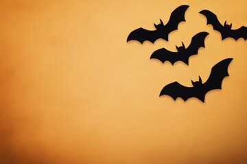 Bats flying against a sunset colored sky in the evening twilight hours