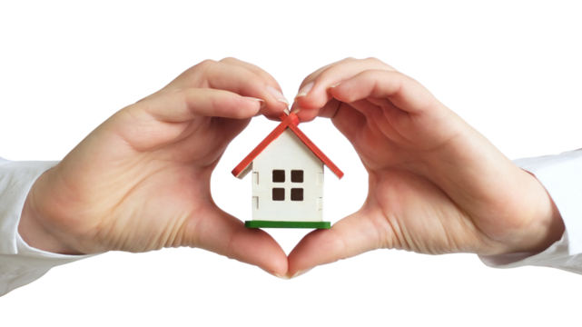 A female hands in a white shirt holding a small house