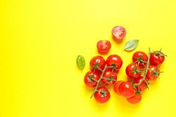 Bunch of fresh red tomatoes on color background, top view