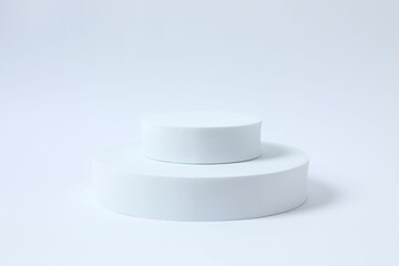 Props for product photography. Different podiums on a white background