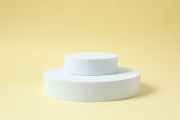 Props for product photography. Different podiums on a colored background