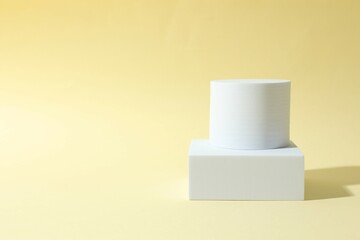 Props for product photography. Different podiums on a colored background