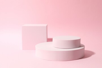 Props for product photography. Different podiums on a colored background