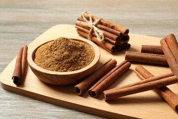 Aromatic cinnamon on a wooden background