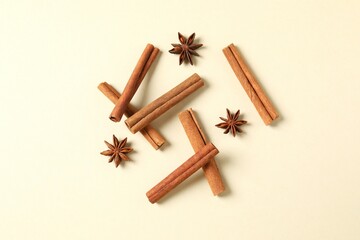 Aromatic cinnamon and anise stars on a color background