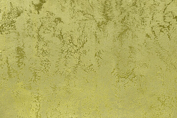Texture of golden decorative plaster or concrete. Grunge background for design.